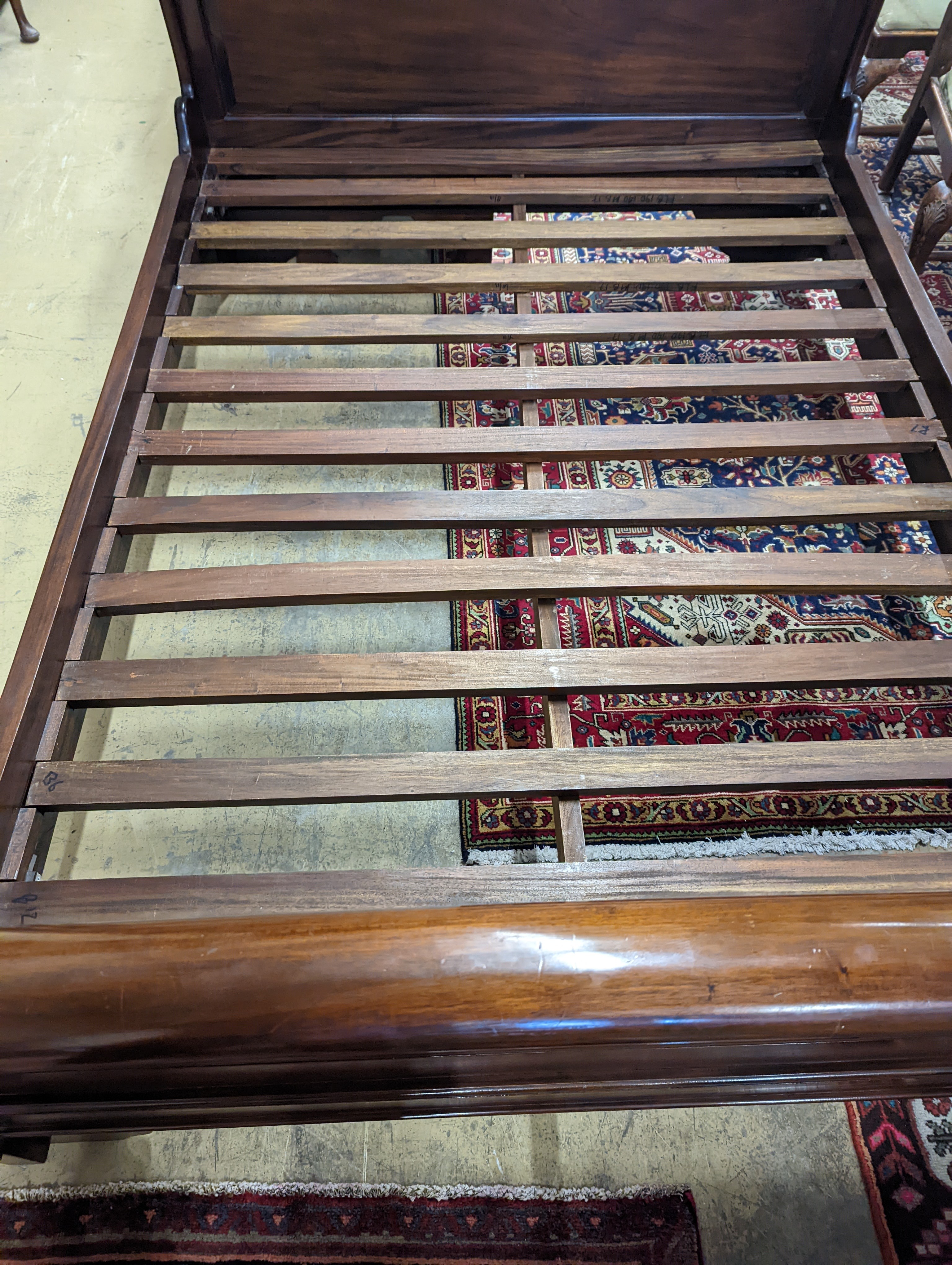 A French style mahogany sleigh bed, length 210cm, width 148cm